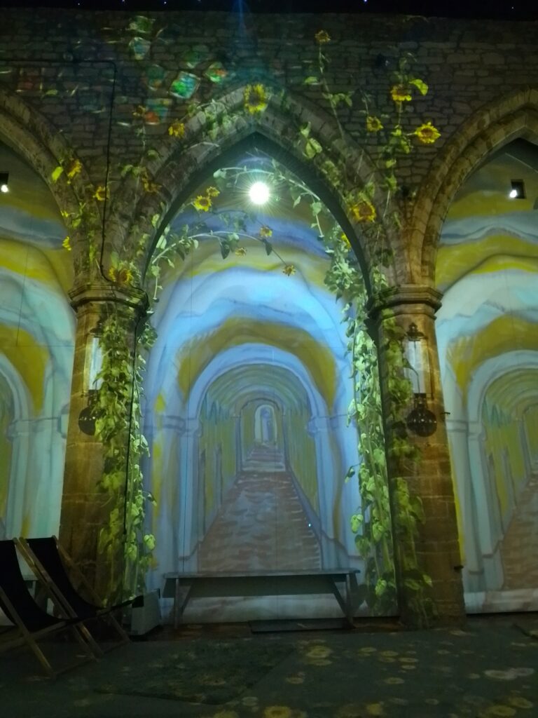 Van Gogh Exhibition sunflowers projected on church walls